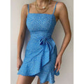 Blue dress with ruffles and a bow at the waist