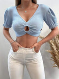 Bluză crop albastră cu decupaj frontal